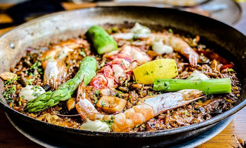 Essential Ingredients of Traditional Paella: A Guide